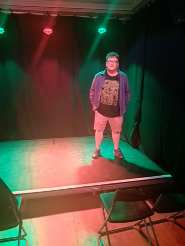 Me on stage in the empty room