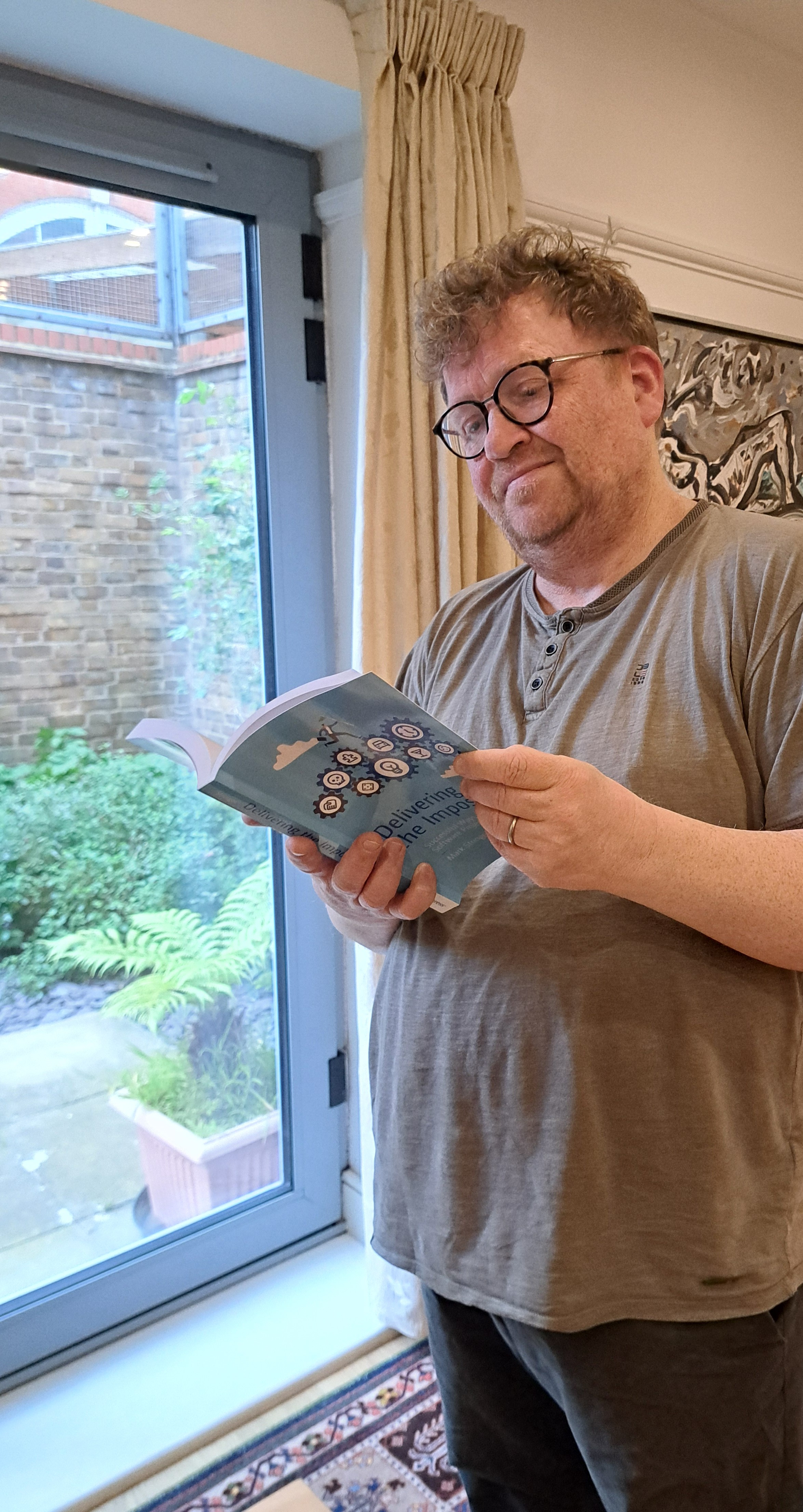 Mark Stringer reading Delivering the Impossible